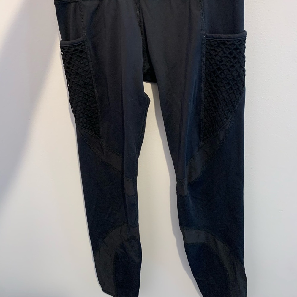 Noli black leggings. Netted pockets & mesh design